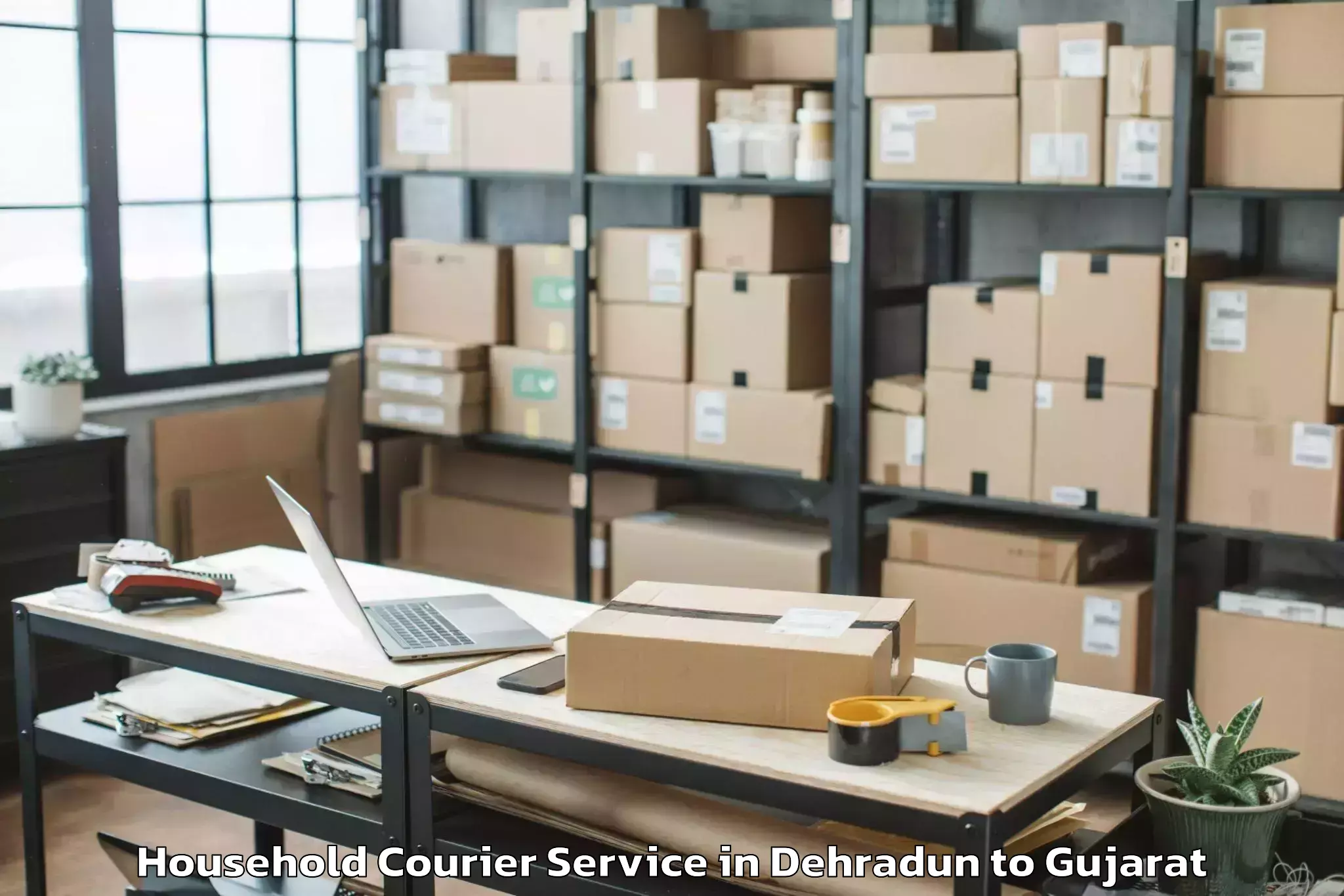 Easy Dehradun to Madhavpur Household Courier Booking